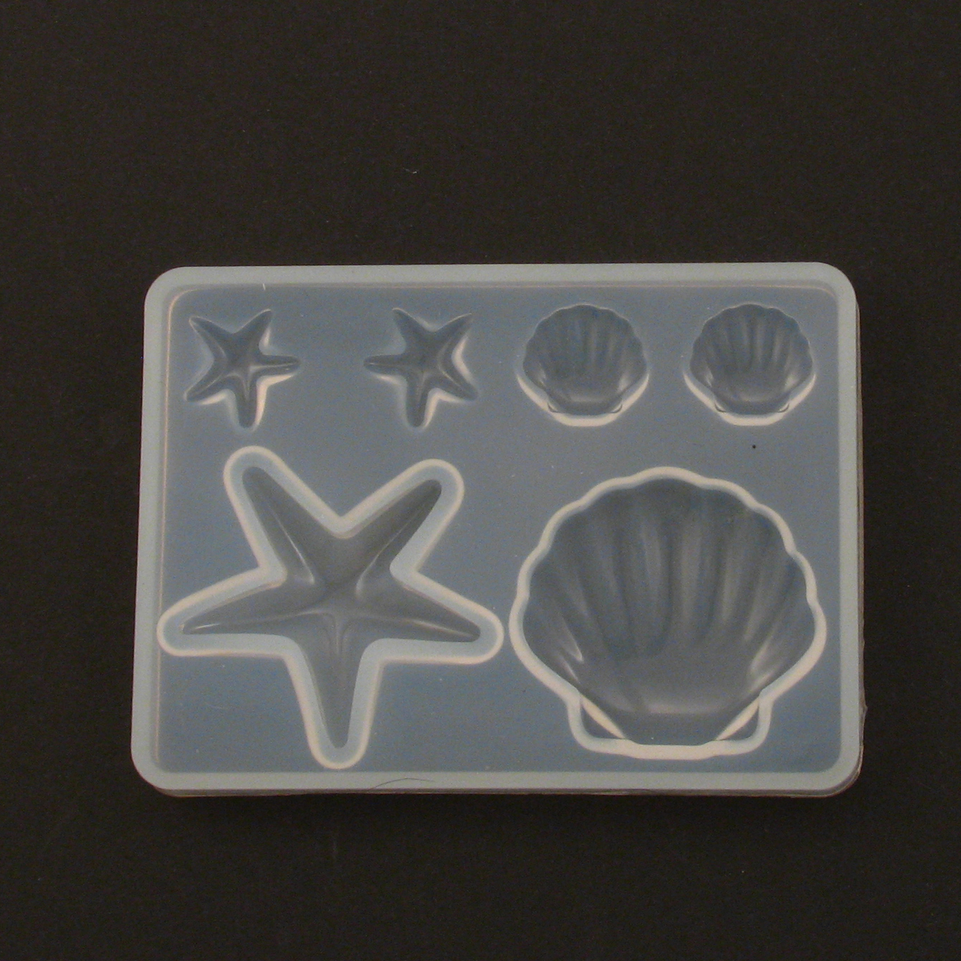 Kalup morski , Školjke i zvijezde vel 85x61x7 mm, 6 motiva 13 do 33 mm, VSP11